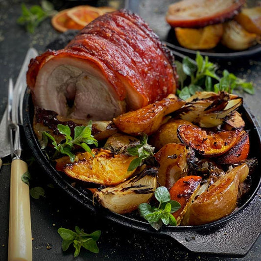 ROLLED PORK LOIN WITH CARAMELIZED ORANGES, PEARS AND ONIONS